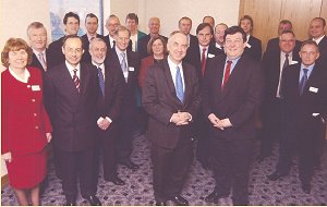 Transport minister David  Jamieson, front left, with  MP Lawrie Quinn and local  business and council  leaders at Scarborough  Building Society's  headquarters for meeting  on A64 upgrading.