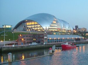 HMS Calliope along the quayside in front of The Sage