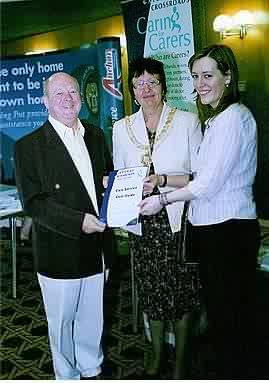 Above, David Clelland with the Mayor of Gateshead Cllr Maureen Goldsworthy and Natalie Freeman from the Gateshead Crossroads project during their visit to the Gateshead Carers Association Open Day at the Civic Centre.