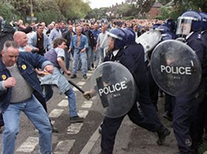 Police confront striking miners during the strike