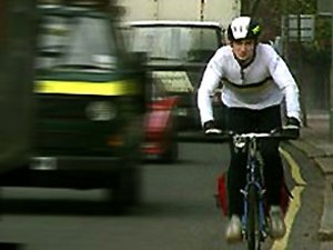 A cyclist in traffic