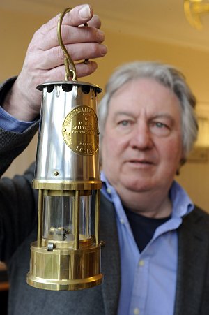 Eric with the Miners' lamp presented by the men from Ellington Colliery.