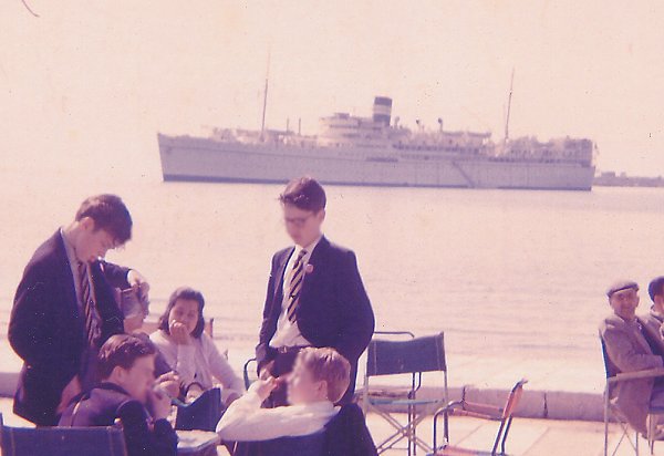 The only picture the author has of Ruth. Taken at Piraeus in Greece, with our ship in the background.