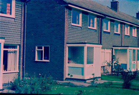 Our first little house, 1970. 'Karen' in the side window watching me.