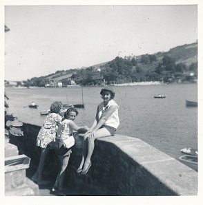 An early visit to Salcombe, with sister Frances sitting on the wall, Mum looking round.  This near the bottom of the hotel gardens.