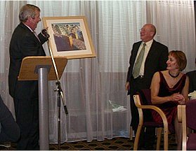Brendan Foster present David with a picture of the Great North Run