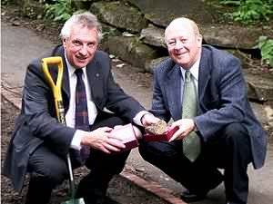 David and Cllr John McElroy,  Gateshead Council's member dealing with Culture and Leisure - digging up the stone in Saltwell Park to take to the Isle of Man