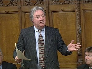 Eric served as the city’s MP for 23 years, shown here in the Commons.