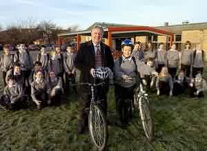 Eric Martlew with some of the pupils of Newman School, Carlisle.