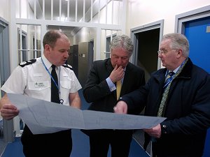 Cumbria's Chief Constable, Craig Mackey, Eric Martlew and Cllr Reg Watson (Chair of the Police Authority) looking over the plans for the new Carlisle Police Station which is to be built at Harraby