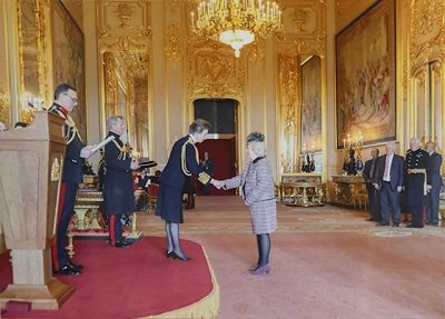HRH The Princess Royal presenting Elsie Martlew with her MBE