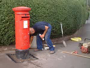 Contractors re-site the post-box